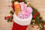 5 Ulta products in Christmas stocking (lifestyle image/close up shot)