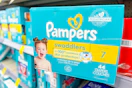 box of pampers diapers on a store shelf
