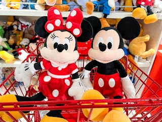 minnie and mickey mouse plushies in a shopping cart