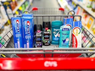 two Axe body sprays, two Degree deodorants, three Crest toothpastes, and two Colgate toothpaste in shopping cart