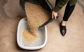 A Pet Mate Arm & Hammer Litter Box.