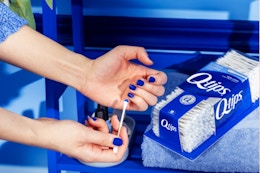 Q-tips Cotton Swabs being used to remove nail polish
