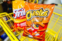 cheetos and fritos in yellow shopping cart