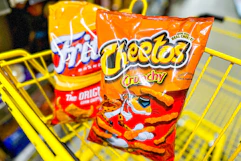 cheetos and fritos in yellow shopping cart