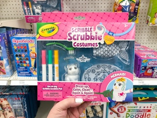 hand holding a crayola scribble scrubbie costumes at target