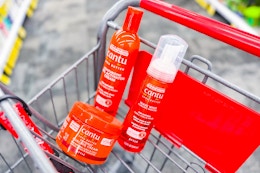 cantu hair care products in a cart
