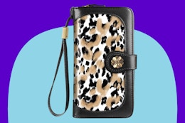 Women Multi Card Holder Wallet Clutch on a blue background.
