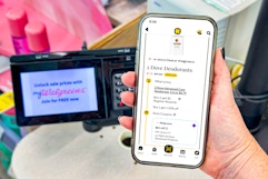 hand holding smartphone with kcl app 1-clip coupon deal