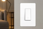 a smart light switch on a wall