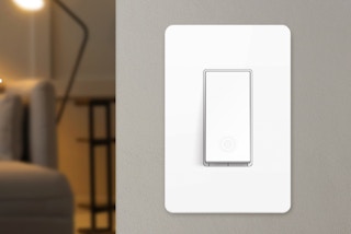 a smart light switch on a wall