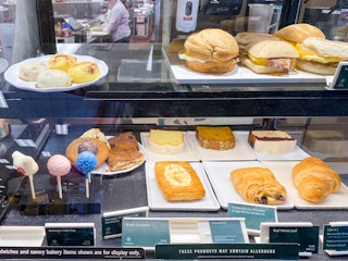 A food display at the counter of a Starbucks.