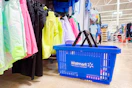 Walmart basket next to women's shorts