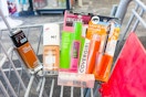 covergirl and maybelline foundation and mascaras in a cart