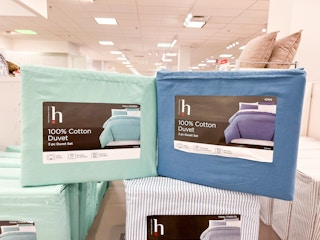 Home Expressions 100 Percent Cotton 3 Piece Duvet Sets on a shelf at JCPenney