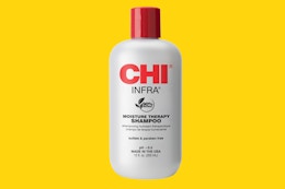 a bottle of shampoo on a yellow background