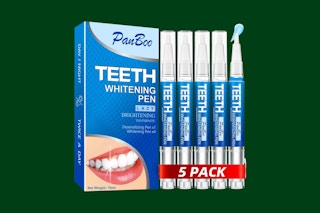 teeth whitening pen set on a green background