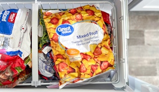 A recalled bag of frozen mixed fruit in a freezer
