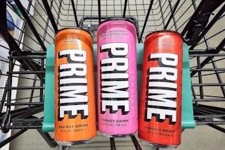 prime energy drinks in a cart