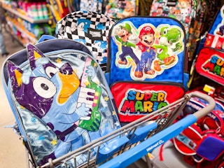 Three character backpacks in Walmart shopping cart