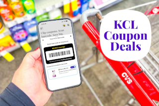hand holding a smartphone displaying a KCL Coupon barcode