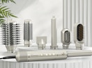 a silver hot air styler set on a table