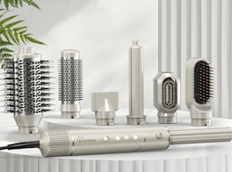 a silver hot air styler set on a table
