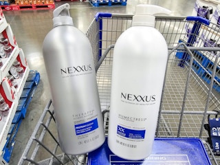 nexxus shampoo and conditioner bottles in a cart