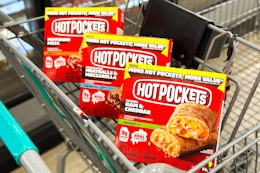 hot pockets sitting side by side in a kroger shopping cart