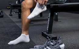 a person putting on socks