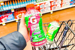 hand holding a bottle of gatorade