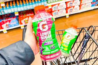 hand holding a bottle of gatorade