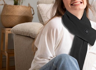 a person wearing a heated scarf 