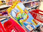 hot wheels track set sitting in a target cart