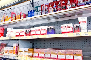 store shelves with l'oreal skincare products
