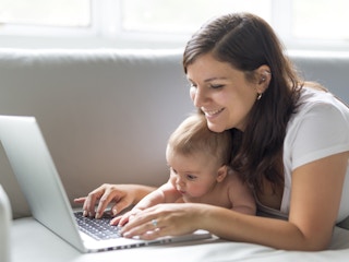 mom and baby looking at computer