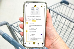 hand holding smartphone showing 1-clip coupon in kcl app