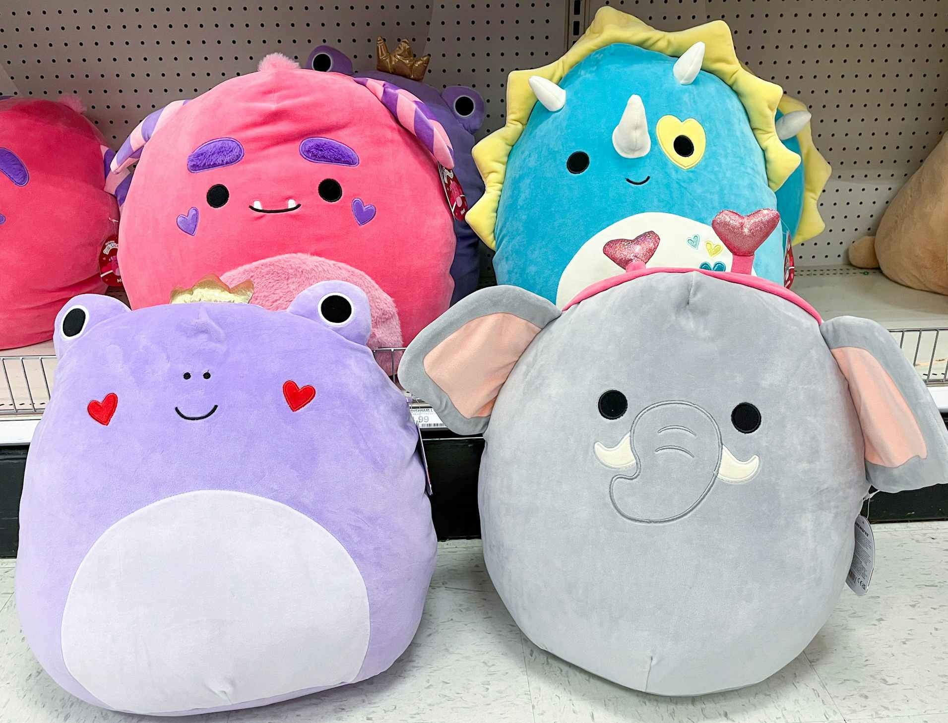 four valentine squishmallows grouped together on the bottom shelf at Target