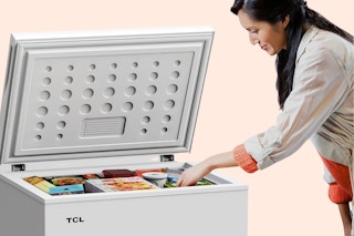 Lifestyle image of TCL Chest Freezer being opened and used