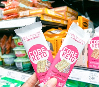 hand holding two keto bars