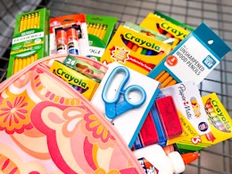 school supplies laying in a shopping cart