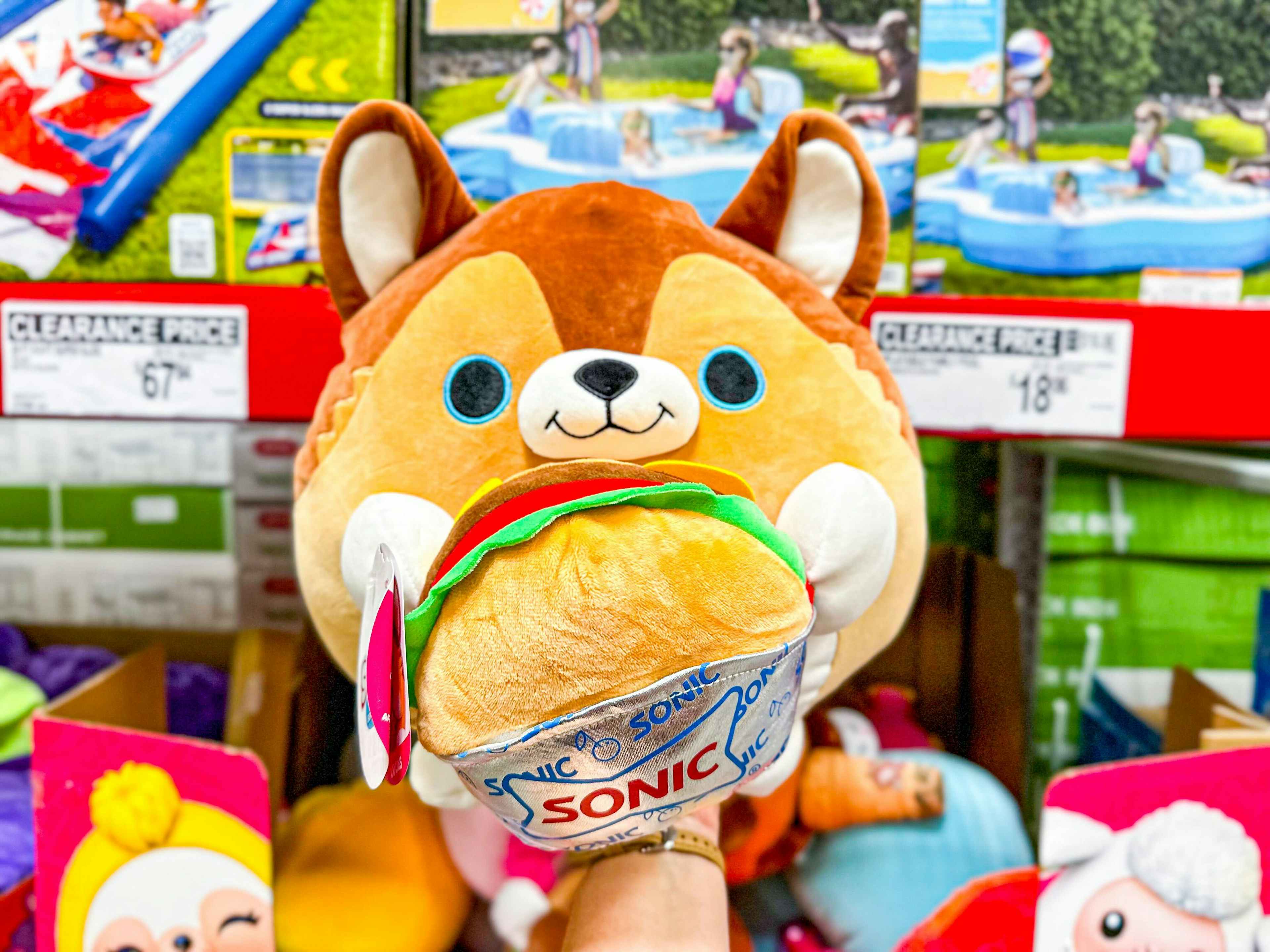 snackles plush holding a sonic burger