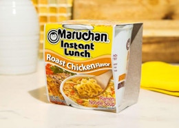 a cup of ramen on a table