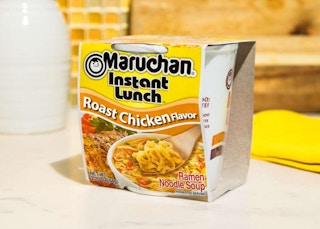a cup of ramen on a table