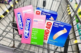 benadryl itch cream and bandaids in a cart