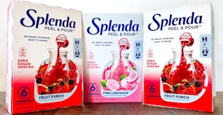 Three boxes of Splenda pull and pour drink mix in fruit punch and pink lemonade flavors