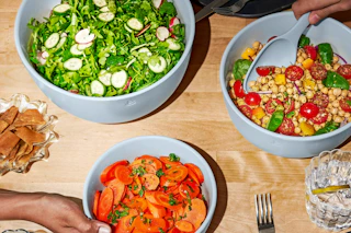 lifestyle image of food in mixing bowls on a table