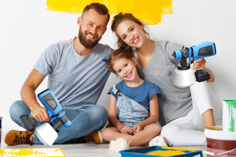 a family with paint sprayers