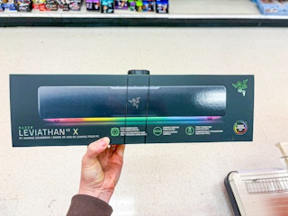 hand holding razer laviathan speaker in target aisle