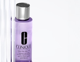a purple bottle of makeup remover