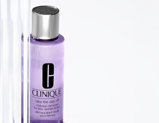 a purple bottle of makeup remover